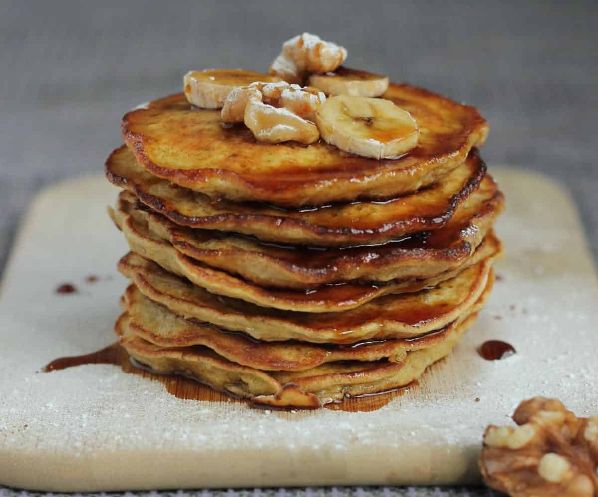  A generous drizzle of maple syrup on top of these delicious sourdough pancakes.