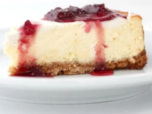  A slice of this cheesecake is like a warm hug on a cold day - irresistible.