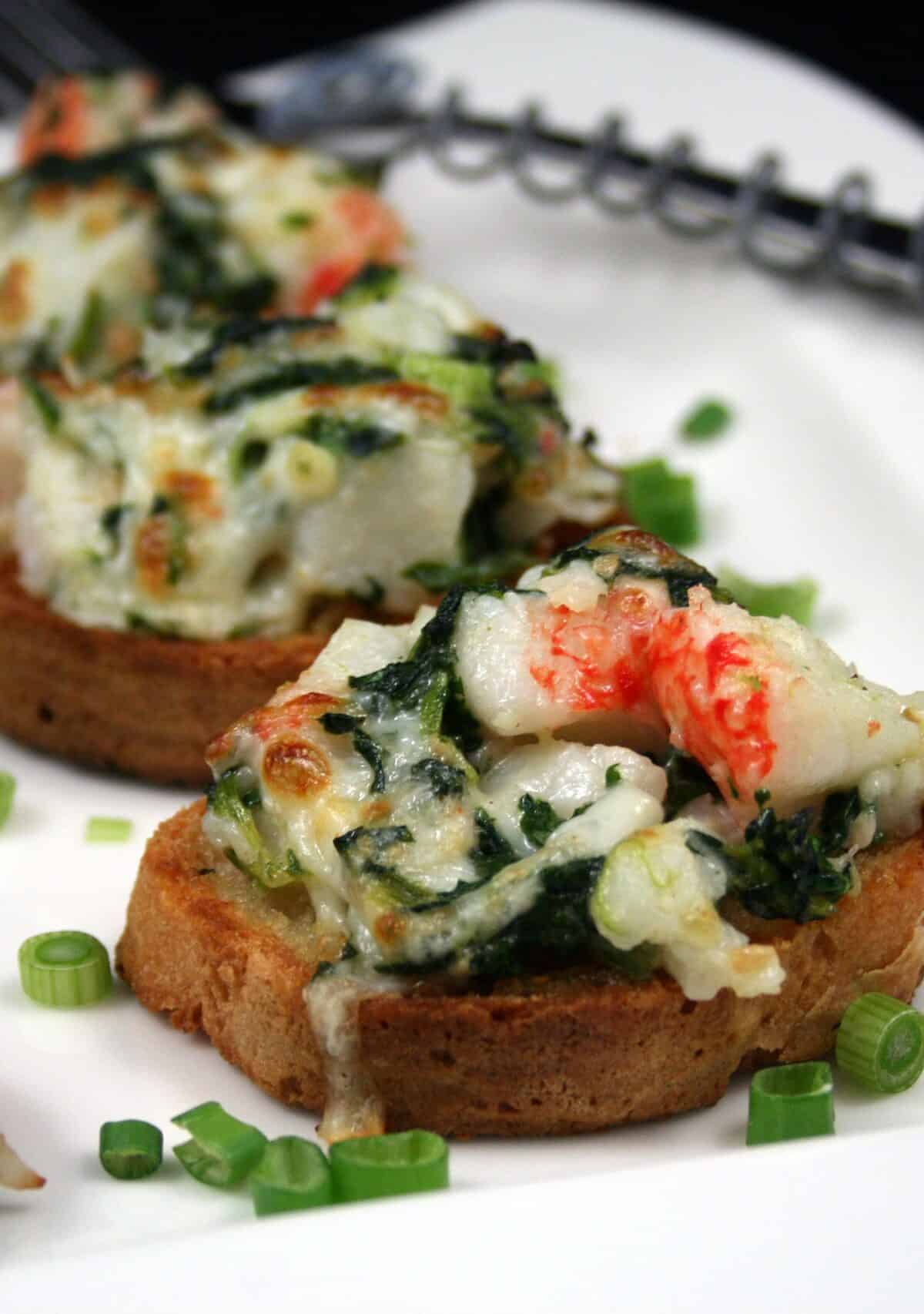 Mouthwatering Garlic Bread with Crab and Spinach Recipe.