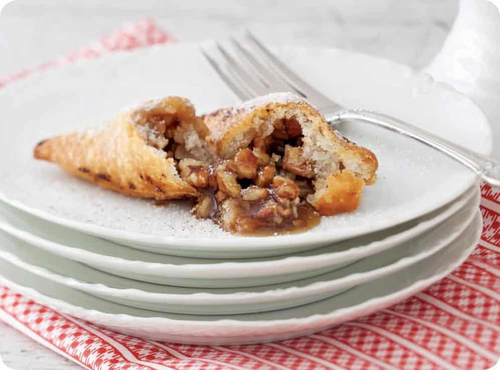  Golden, crispy, and filled with gooey pecan filling - you won't be able to resist this dessert.