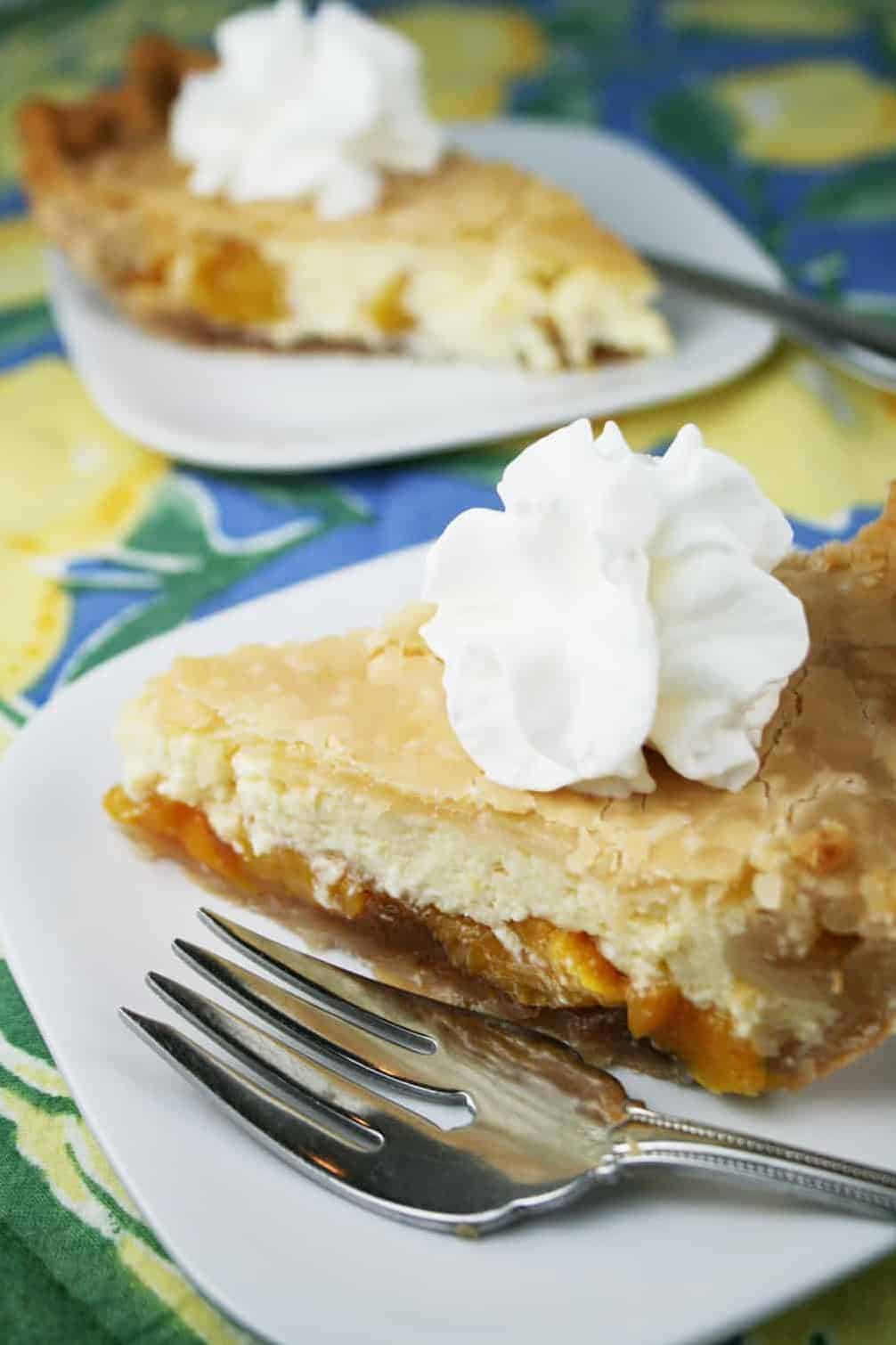  Juicy, sweet peaches meet cheesy goodness in this delicious Peacheesy Pie.