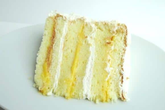  Let the golden yellow filling do all the talking in this stunning cake.