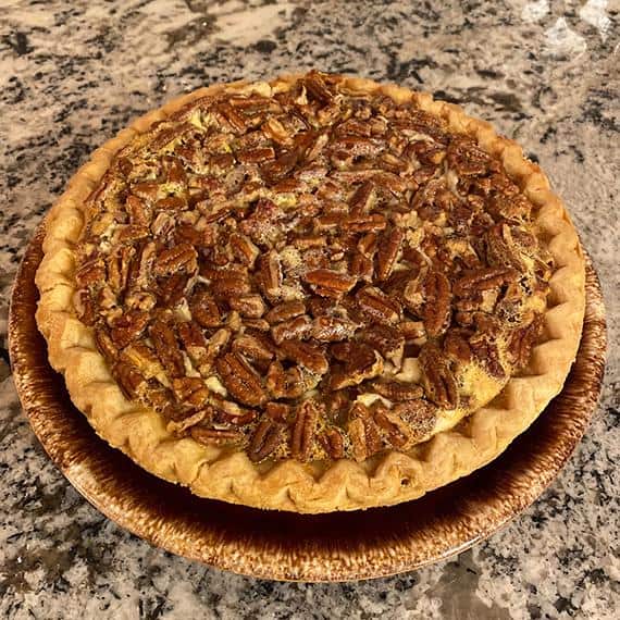  Plated, sliced, and ready to be savored, Mystery Pecan Pie is the perfect dessert.