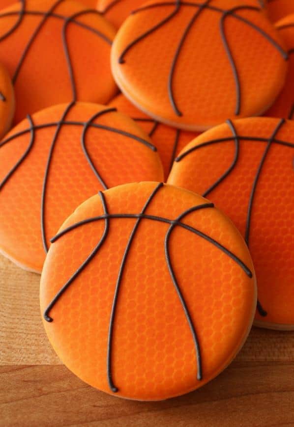  Slam dunk your cravings with these satisfying basketball team cookies!
