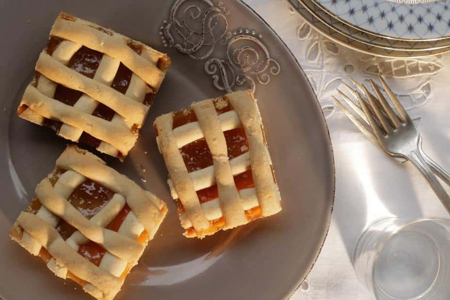  Sweet and tangy jam filling oozing out of the tender pastry crust