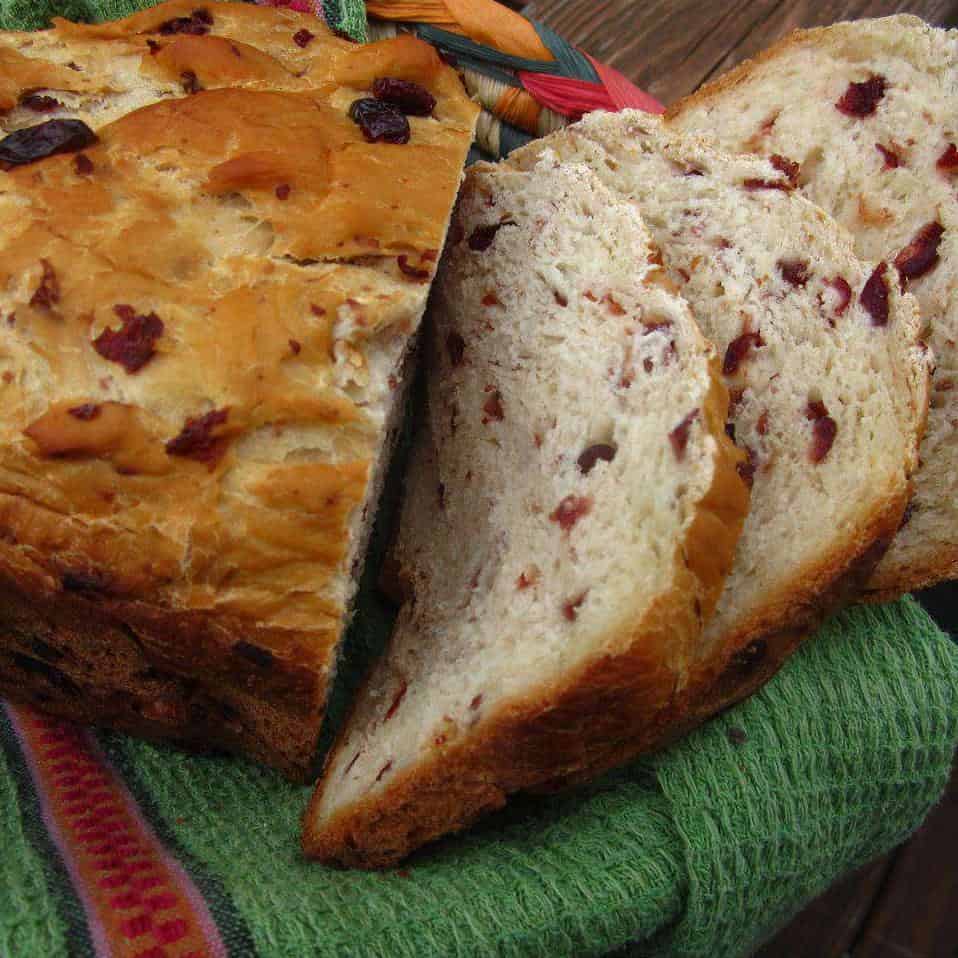  The bright colors of the cranberries and oranges make this bread visually appealing.