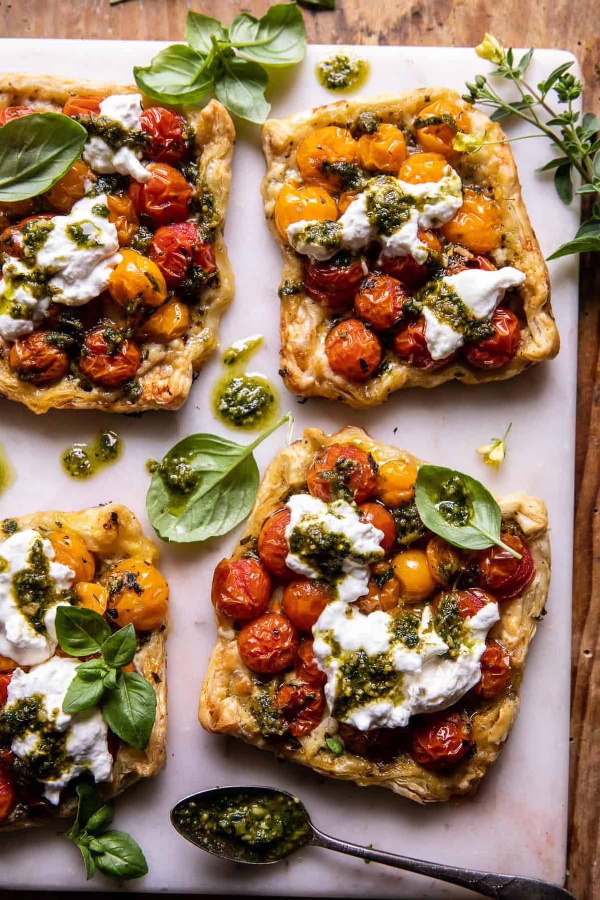  The perfect combination of tangy tomatoes and savory pesto on a flaky crust