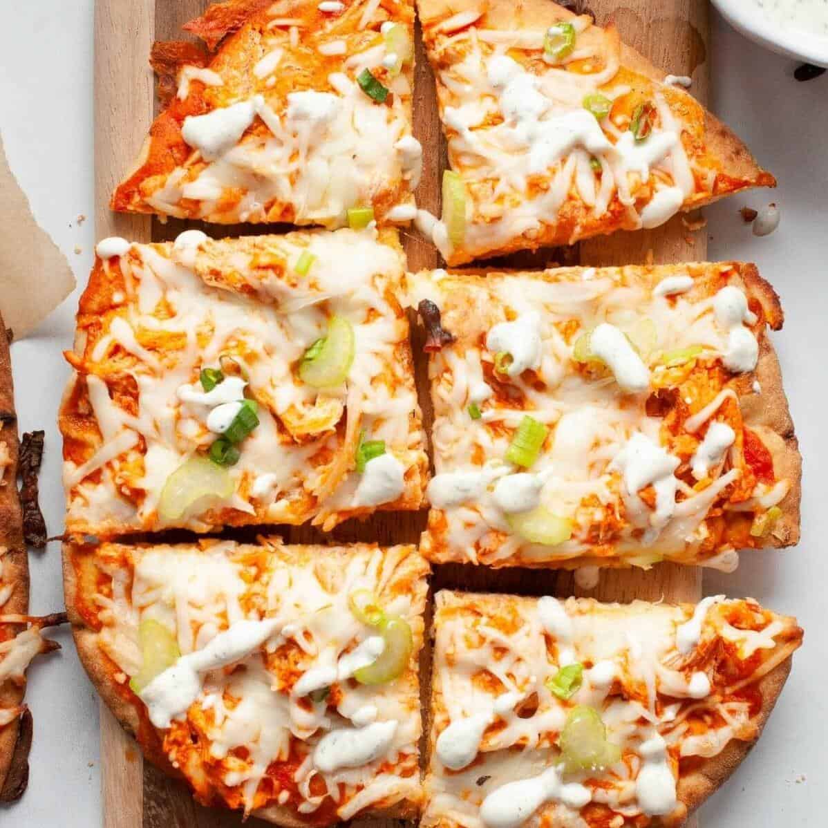  These pita pizzas are crispy, savory, and packed full of delicious toppings!