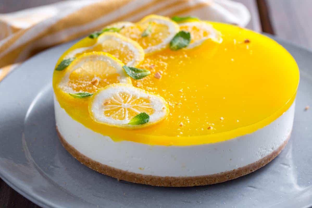  This classic cheesecake recipe gets a zesty twist with the addition of tangy lemon curd and Italian Limoncello liqueur.