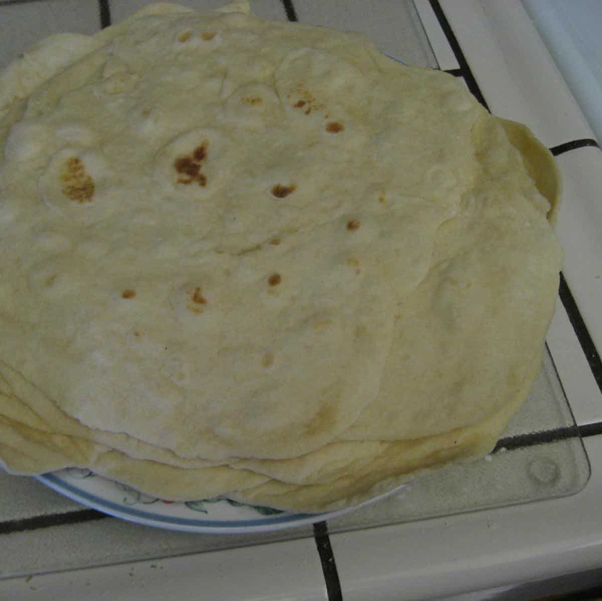  Watch the dough transform into delicious flour tortillas with this recipe!