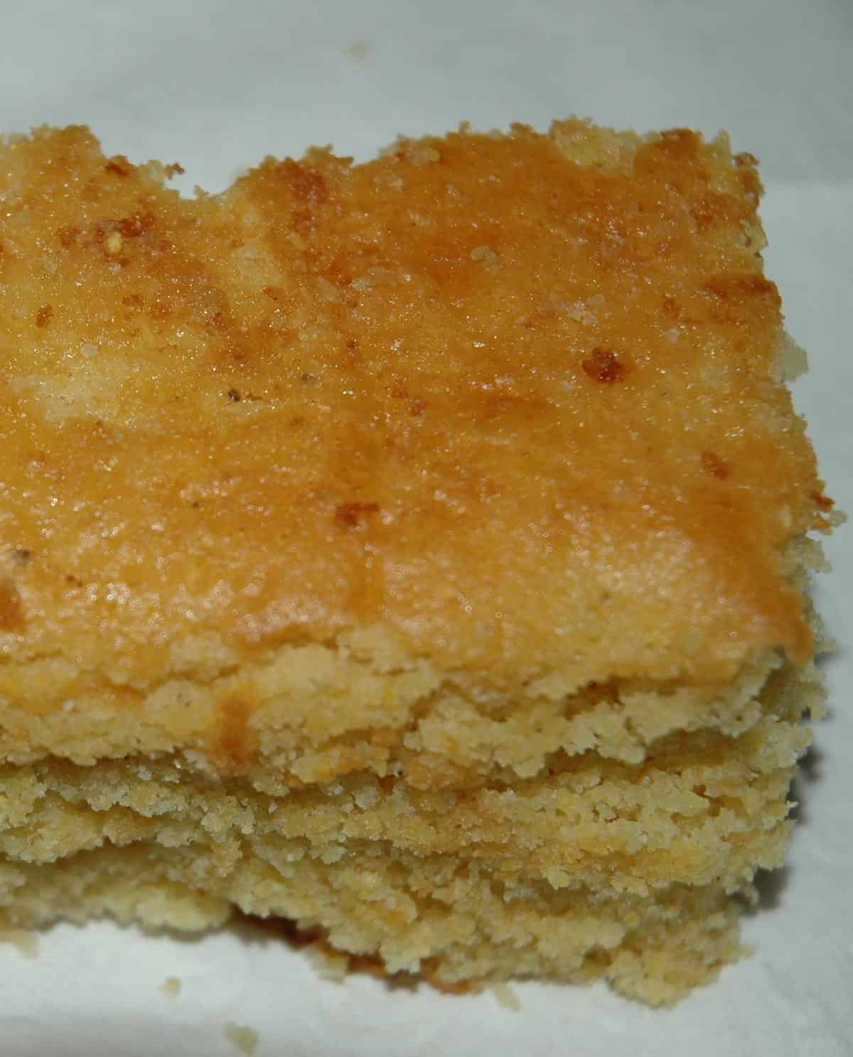  With this Moist Johnny Cake recipe, you won't need to leave the comfort of your home to savor the perfect cornmeal cake.
