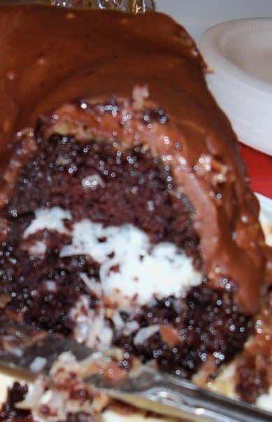  You won't be able to resist the chocolatey aroma of this Peter Paul Mounds Cake.